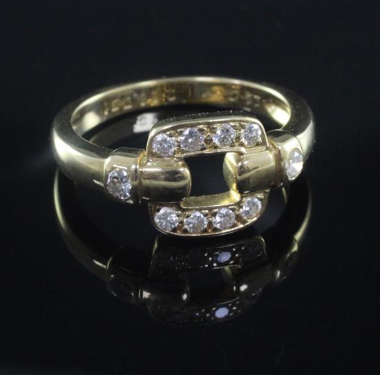 A Cartier gold and diamond ring, size M.